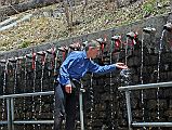 413 Muktinath Chumig Gyatsa Jerome Ryan At 108 Water Spouts Jerome Ryan puts his hand below each water spout at Muktinath and touched his forehead, kind of like the Catholic Church's 'holy water'.
